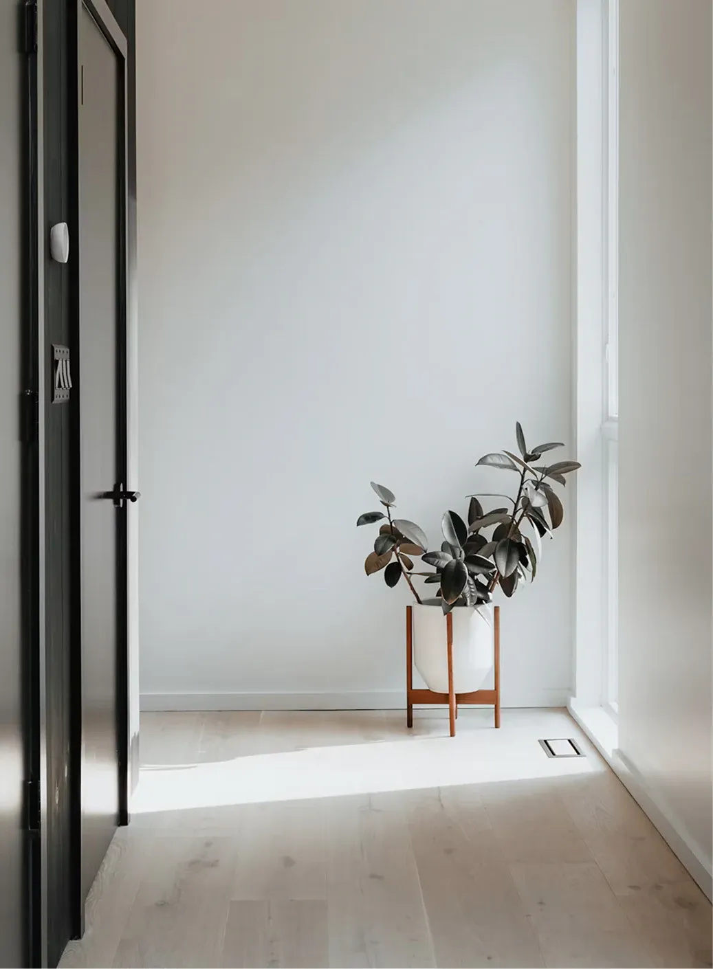 An open interior doorway onto a hallway, the gap a chamber has to pass through