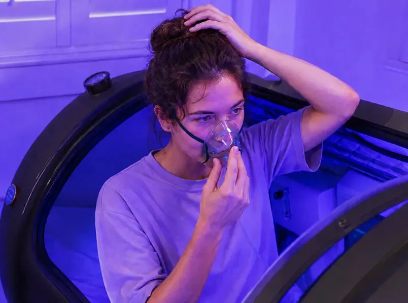 Hyperbaric oxygen therapy session in a premium wellness setting