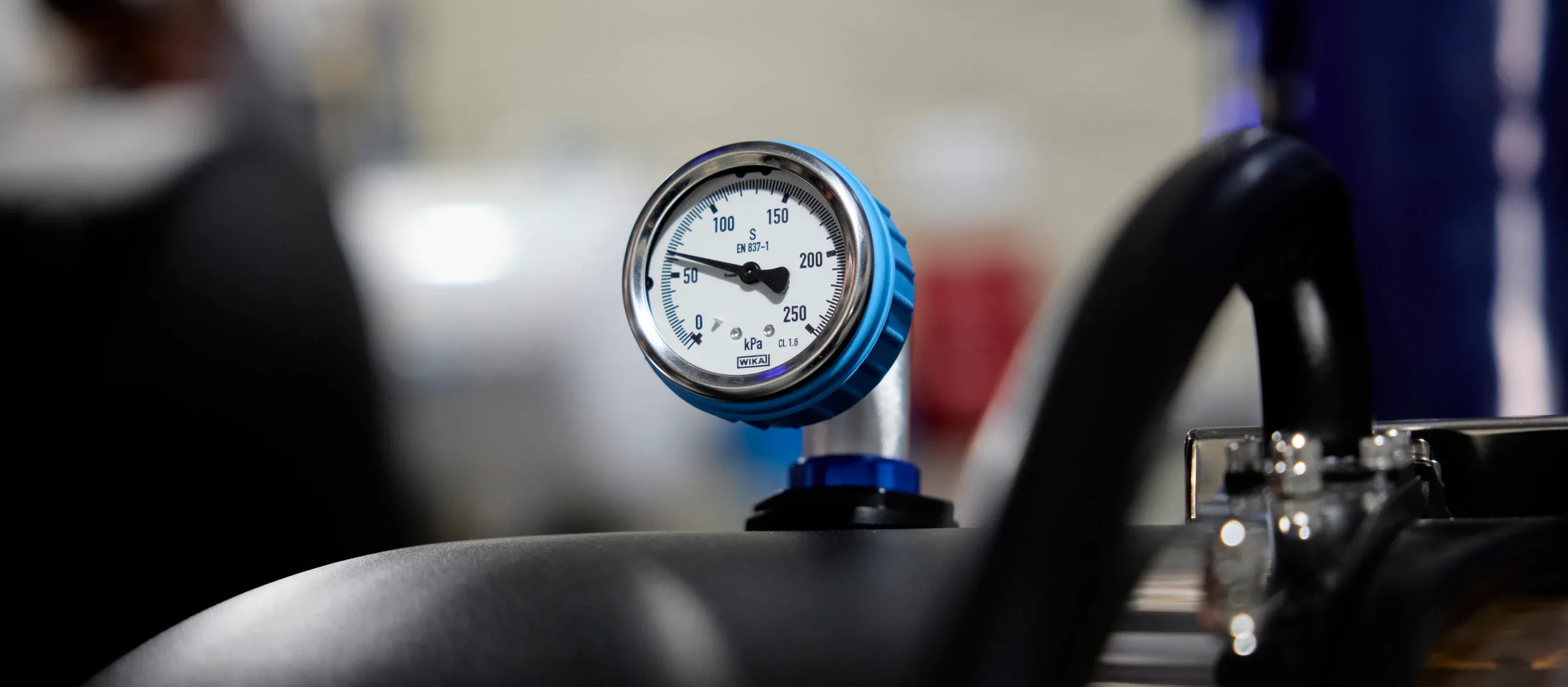 Close-up of the mechanical pressure relief gauge on a Superhuman chamber