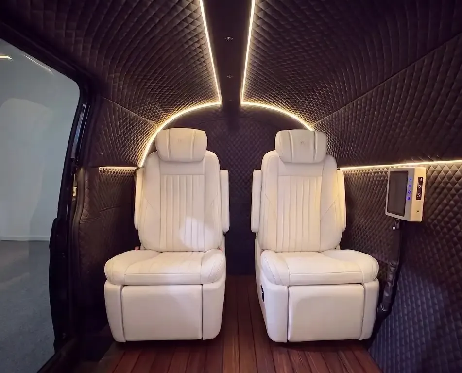 Two reclined leather seats inside the T2 cabin