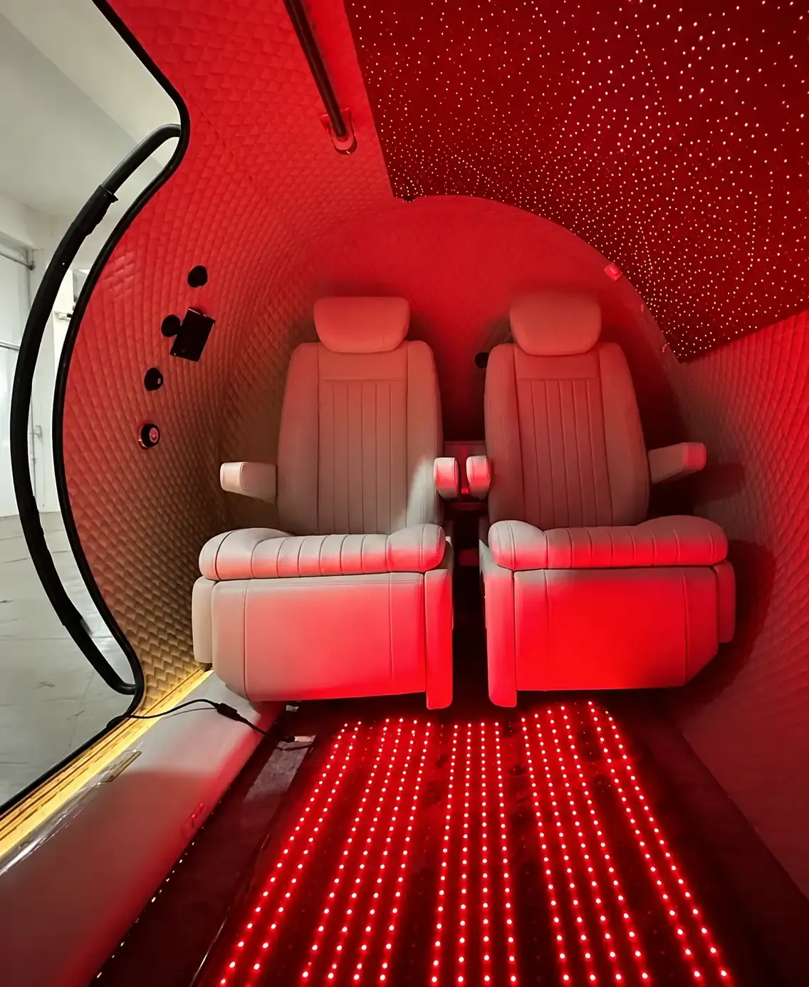 T2 interior in red light-therapy mode